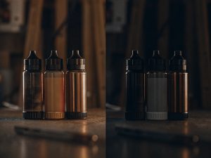 A variety of colorful Raz vapes fanned out, showcasing an affordable way to access many flavors