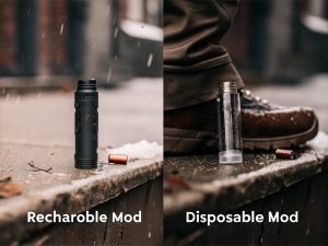A disposable vape lying on the ground near a recycling symbol, highlighting the environmental choice