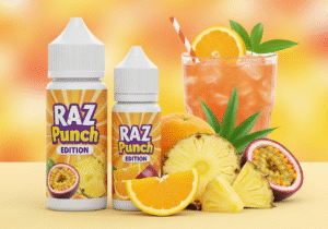 A Glass of Hawaiian Fruit Punch A glass of red Hawaiian fruit punch next to the carton on a kitchen counter.